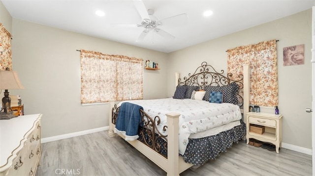 2648 N G St, San Bernardino, CA 92405 - bedroom with light wood-style floors, a ceiling fan, and recessed lighting