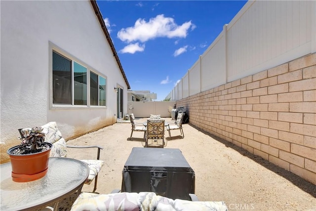 32469 Peters St, Menifee, CA 92584 - fenced backyard featuring a patio area and outdoor dining area