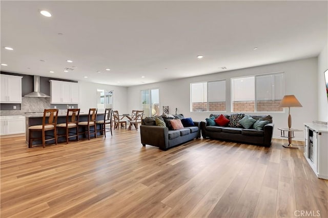 32469 Peters St, Menifee, CA 92584 - living room featuring recessed lighting and light wood-type flooring