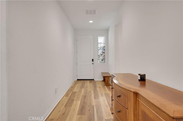 32469 Peters St, Menifee, CA 92584 - doorway to outside featuring light wood-style floors and recessed lighting