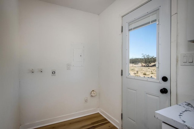 5655 Last Mile Rd, Johnson Valley, CA 92285 - laundry area with hookup for an electric dryer, wood finished floors, and gas dryer hookup