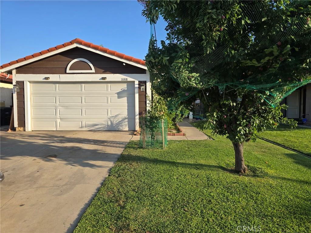 1888 Union St, Colton, CA 92324 - garage featuring driveway