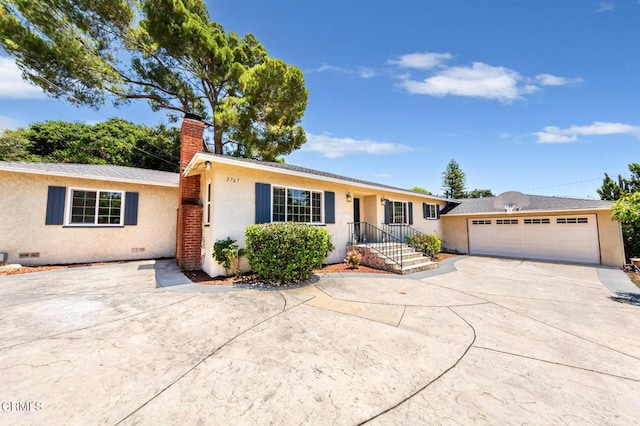 2767 Brookhill St, La Crescenta, CA 91214 - ranch-style house with a chimney, driveway, stucco siding, and a garage