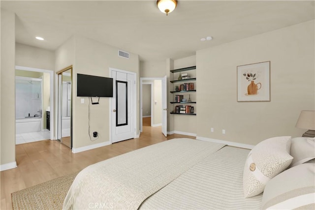5242 Vesper Ave Unit 7, Sherman Oaks, CA 91411 - bedroom featuring wood finished floors, ensuite bath, and recessed lighting