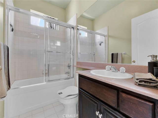 5242 Vesper Ave Unit 7, Sherman Oaks, CA 91411 - bathroom featuring tile patterned flooring, vanity, and bath / shower combo with glass door