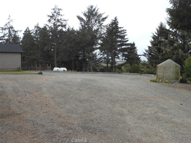 1020 Alpha St, Eureka, CA 95503 - view of yard with a greenhouse and an outdoor structure