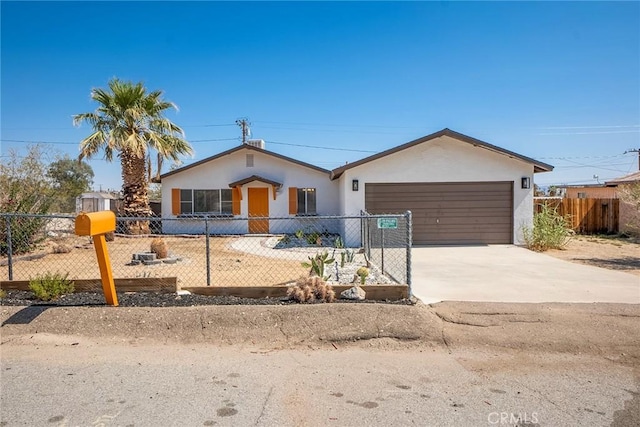 73570 Cedar Dr Unit 29, Palms, CA 92277 - single story home featuring stucco siding, an attached garage, driveway, and a fenced front yard