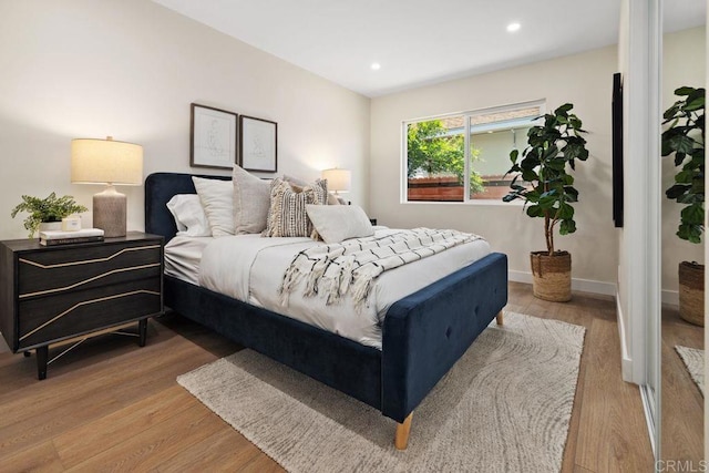 5461 Waring Rd, San Diego, CA 92120 - bedroom with light wood-type flooring and recessed lighting