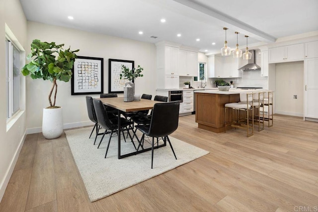 5461 Waring Rd, San Diego, CA 92120 - dining area with light wood-style floors, recessed lighting, and beam ceiling