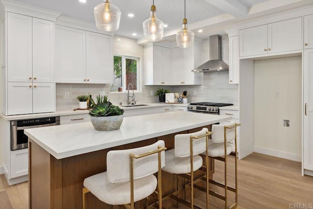 5461 Waring Rd, San Diego, CA 92120 - kitchen featuring wall chimney exhaust hood, oven, tasteful backsplash, recessed lighting, and light wood-style floors