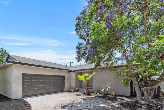 5461 Waring Rd, San Diego, CA 92120 - view of front of property featuring a garage, concrete driveway, and stucco siding