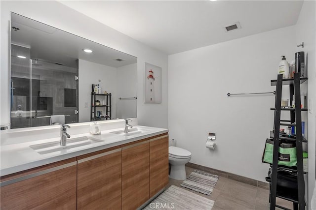 3785 Wilshire Blvd Unit 1605, Los Angeles, CA 90010 - bathroom with double vanity, a stall shower, and tile patterned floors