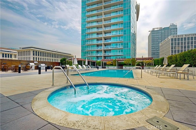 3785 Wilshire Blvd Unit 1605, Los Angeles, CA 90010 - community pool featuring a community hot tub and a patio