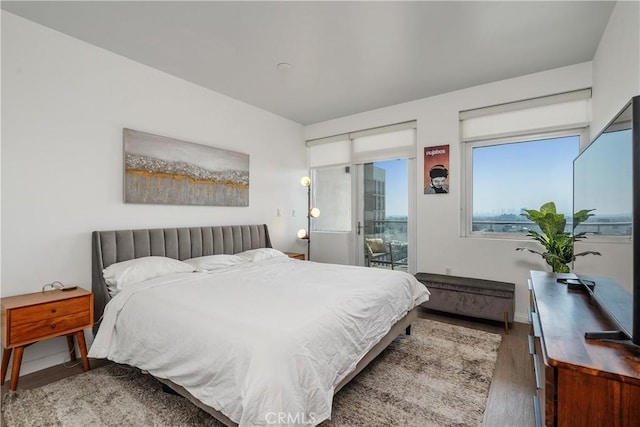 3785 Wilshire Blvd Unit 1605, Los Angeles, CA 90010 - bedroom featuring wood finished floors and baseboards