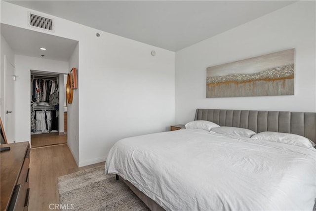 3785 Wilshire Blvd Unit 1605, Los Angeles, CA 90010 - bedroom with wood finished floors and baseboards