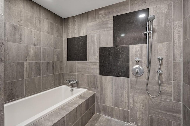 3785 Wilshire Blvd Unit 1605, Los Angeles, CA 90010 - bathroom with a relaxing tiled tub and tiled shower