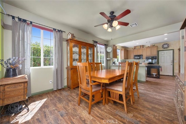 10705 Topiary Dr, Bakersfield, CA 93306 - dining area featuring wood finished floors, a ceiling fan, and recessed lighting