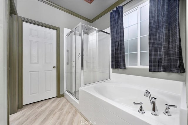 10705 Topiary Dr, Bakersfield, CA 93306 - full bath with crown molding, a shower stall, a garden tub, and wood finished floors