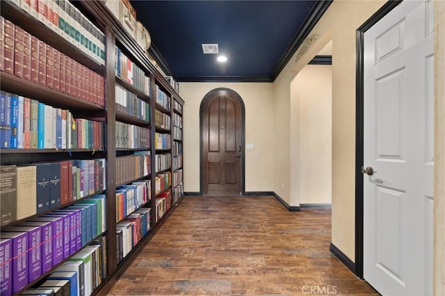 10705 Topiary Dr, Bakersfield, CA 93306 - foyer featuring ornamental molding, wood finished floors, arched walkways, and recessed lighting