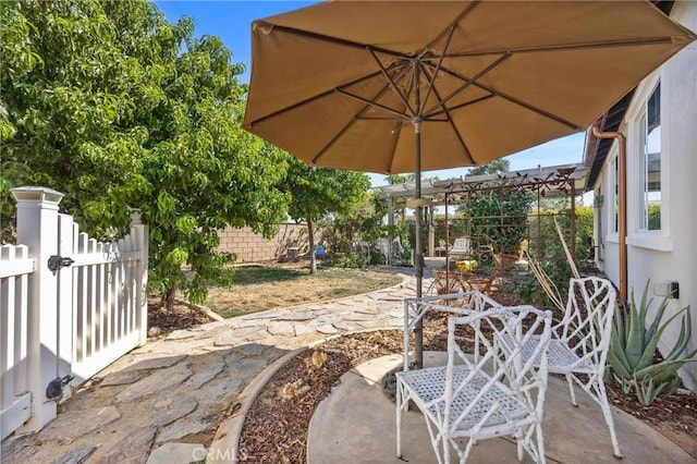 10705 Topiary Dr, Bakersfield, CA 93306 - view of patio / terrace with a gate