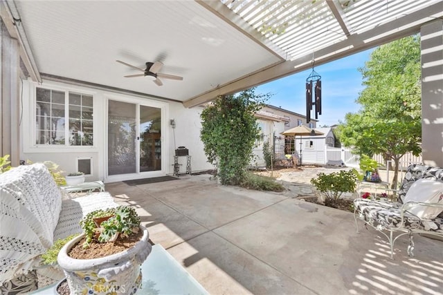 10705 Topiary Dr, Bakersfield, CA 93306 - view of patio with a ceiling fan and a storage shed