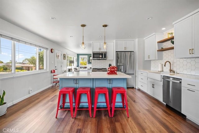 1620 Alrita St, San Luis Obispo, CA 93401 - kitchen featuring stainless steel appliances, open shelves, white cabinetry, dark wood-type flooring, and recessed lighting