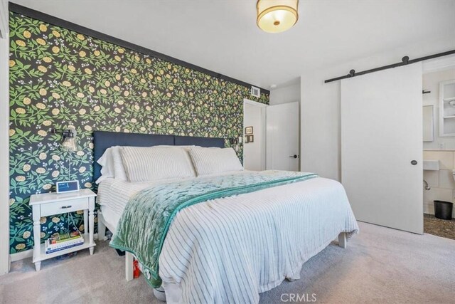 1620 Alrita St, San Luis Obispo, CA 93401 - bedroom with carpet flooring, wallpapered walls, and a barn door