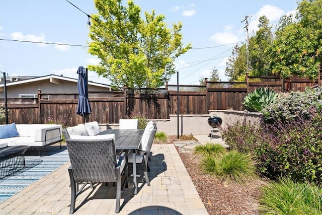 1620 Alrita St, San Luis Obispo, CA 93401 - fenced backyard with a patio, outdoor dining area, and outdoor lounge area