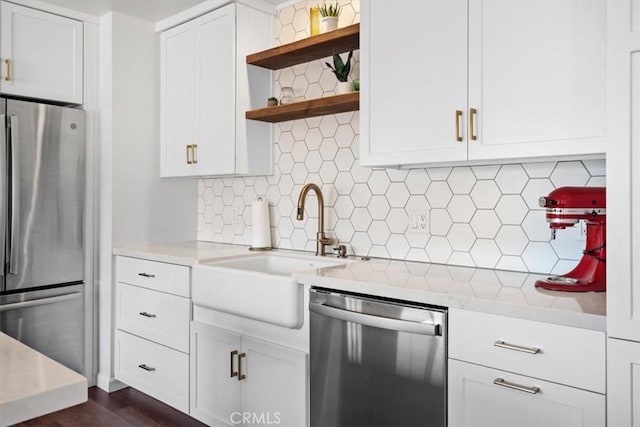 1620 Alrita St, San Luis Obispo, CA 93401 - kitchen with appliances with stainless steel finishes, open shelves, light countertops, and decorative backsplash