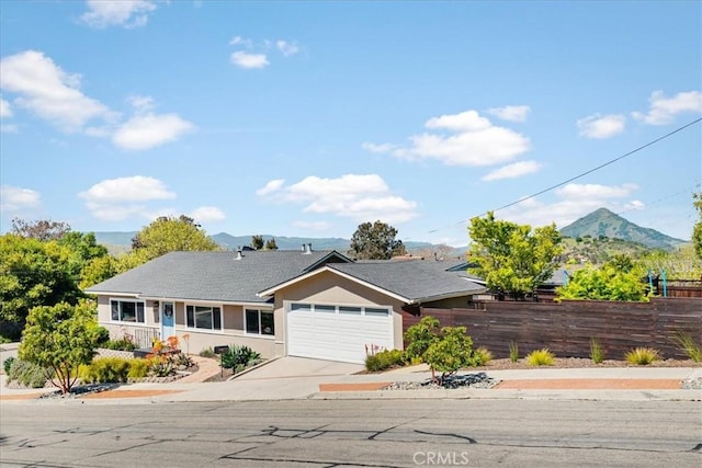 1620 Alrita St, San Luis Obispo, CA 93401 - ranch-style house with a garage, driveway, stucco siding, and a mountain view