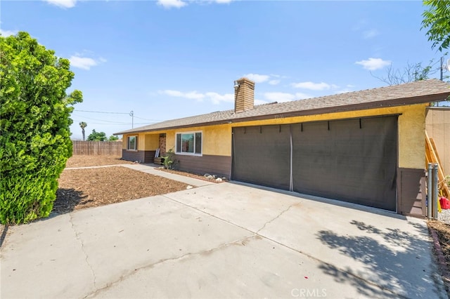 27636 Ethanac Rd, Menifee, CA 92585 - single story home with a garage, stucco siding, and a chimney