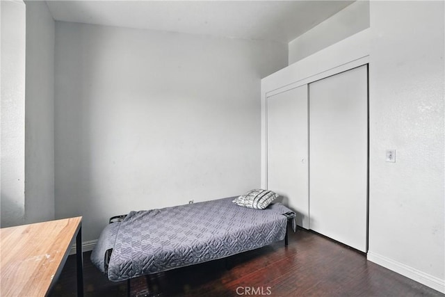 13905 Caspian Way, Moreno Valley, CA 92553 - bedroom featuring wood finished floors and a closet