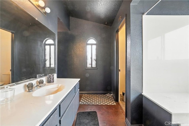 13905 Caspian Way, Moreno Valley, CA 92553 - bathroom featuring vanity and a textured wall