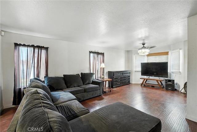 13905 Caspian Way, Moreno Valley, CA 92553 - living room featuring wood finished floors, a chandelier, and a textured ceiling
