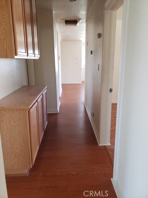 5342 W W Ave L8, Lancaster, CA 93536 - hall with dark wood-style floors