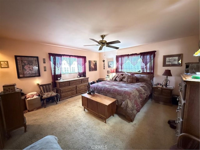 59663 Sunway Dr, Yucca Valley, CA 92284 - bedroom featuring light carpet and a ceiling fan