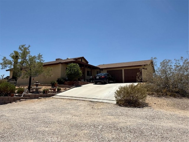 59663 Sunway Dr, Yucca Valley, CA 92284 - single story home featuring an attached garage and driveway
