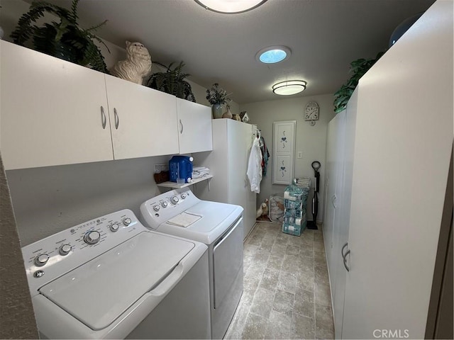 59663 Sunway Dr, Yucca Valley, CA 92284 - washroom featuring washer and dryer and cabinet space