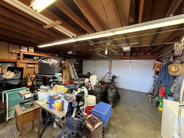 59663 Sunway Dr, Yucca Valley, CA 92284 - garage featuring a garage door opener