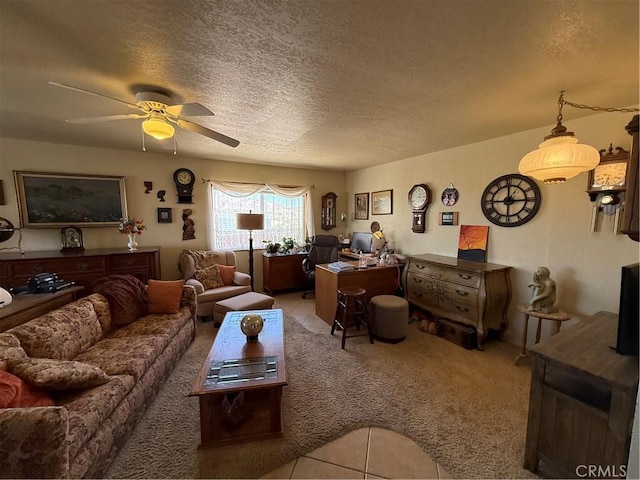59663 Sunway Dr, Yucca Valley, CA 92284 - carpeted living area with tile patterned flooring, a ceiling fan, and a textured ceiling