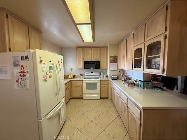 59663 Sunway Dr, Yucca Valley, CA 92284 - kitchen with white appliances, light brown cabinetry, light countertops, light tile patterned floors, and glass insert cabinets