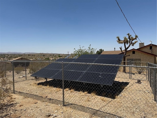 59663 Sunway Dr, Yucca Valley, CA 92284 - back of house with ground mounted solar panels