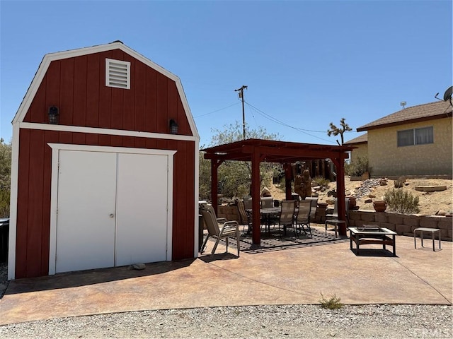 59663 Sunway Dr, Yucca Valley, CA 92284 - view of shed featuring outdoor lounge area, a gazebo, and outdoor dining area