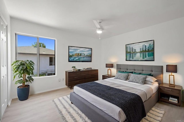 3418 Seabreeze Walk, Oceanside, CA 92056 - bedroom with light wood-style floors and ceiling fan