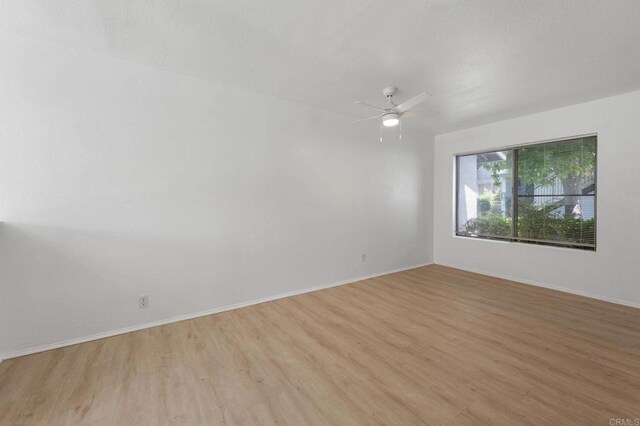 3418 Seabreeze Walk, Oceanside, CA 92056 - spare room with light wood-style floors and a ceiling fan