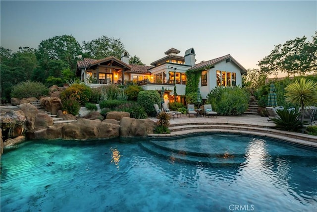 8300 San Diego Rd, Atascadero, CA 93422 - view of swimming pool featuring a pool with connected hot tub, a patio, and stairway