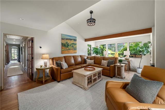 8300 San Diego Rd, Atascadero, CA 93422 - living room with attic access, light wood-style flooring, and vaulted ceiling