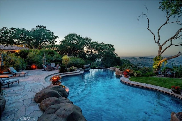 8300 San Diego Rd, Atascadero, CA 93422 - pool at dusk with a patio and an outdoor pool