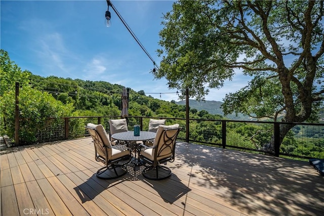 8300 San Diego Rd, Atascadero, CA 93422 - wooden terrace with outdoor dining space and a wooded view