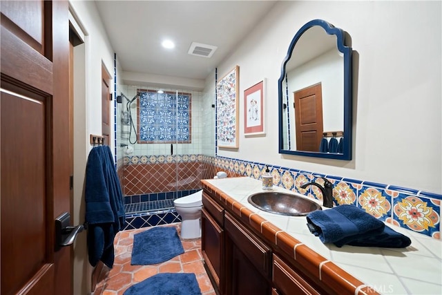 8300 San Diego Rd, Atascadero, CA 93422 - bathroom with vanity, tiled shower, tile patterned floors, and recessed lighting